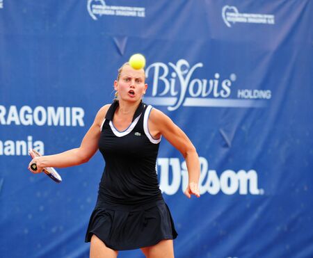 BUCHAREST - August 1: Australian Jelena Dokic in action during the finals of the $75,000 ITF / WTA tournament "Ruxandra Dragomir Open 2010" against Czech Zuzana Ondraskova, August 1 2010, Bucharest, Romania. Dokic won 3/6, 6/1, 7/6(3).のeditorial素材