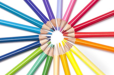 Collection of very brightly colored pencils with tips disposed in a circleの写真素材