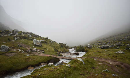Beautiful misty mountain landscape along the Salkantay trek to Machu Picchu, Peru.の写真素材