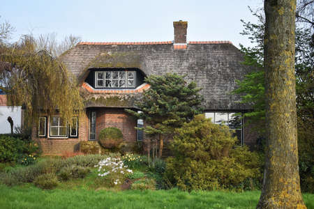 Beautiful house and garden in Amstelveen, a town in the Netherlands.の写真素材