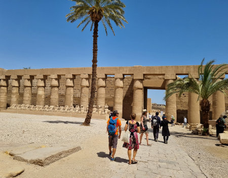 22- March-2022. Part of the Karnak Temple Complex in Luxor, Egypt. Pillars and row of ram-headed sphinxes.のeditorial素材