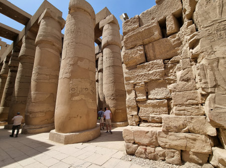 22-March-2022, Karnak temple, Luxor, Egypt. View of the great hypostyle hall, at the temple of Amon-Re in Karnak, with ancient columns and tourists.のeditorial素材