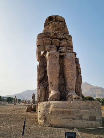 22- March- 2022. Colossi of Memnon, massive stone statue of the Pharaoh Amenhotep III, in the Valley...