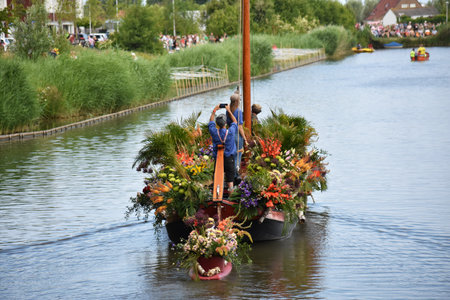 June 26, 2022. Sailing Corso Westland, Netherlands. It is an annual event with boats decorated with beautiful flowers, plants or vegetables.のeditorial素材