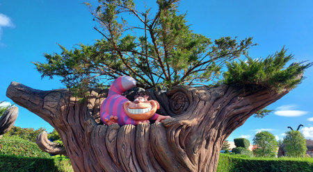 09-17-2022. Model of the Cheshire Cat from Alice's Adventures in Wonderland, in Alice's Curious Labyrinth, Disneyland Paris, France.のeditorial素材