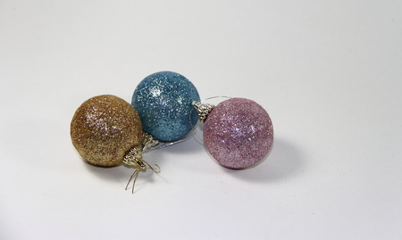 christmas balls on white golden tree with red backgrounds whiteの写真素材