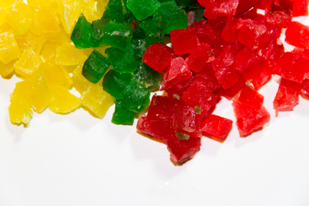 candied fruit colorful glaze on white background for sweet christmas breadの写真素材