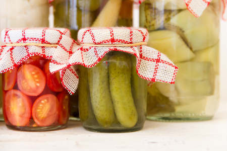 variety of jars with organic vegetable picklesの写真素材
