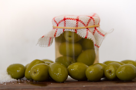 artisanal preparation of healthy pickles of green olivesの写真素材