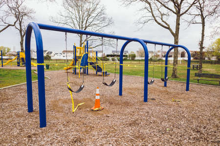 New York, New York - April 29, 2020: A local New York public park is roped off to prevent the spread...