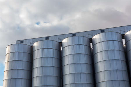 circular silos in industrial zone