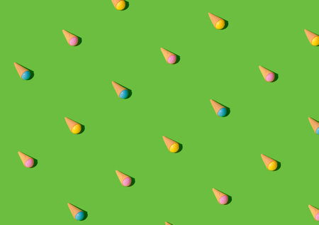 Ice cream patter on a green background. Colorful sweet icecream layout.の写真素材