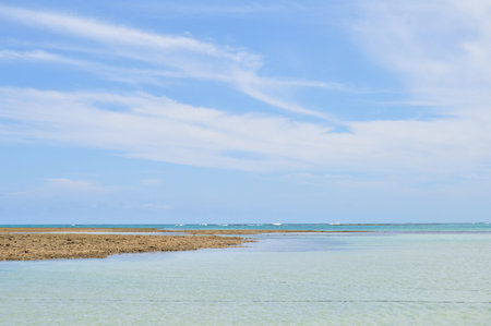 Boat on the beach at Morro de Sao Paulo, Brazilの写真素材