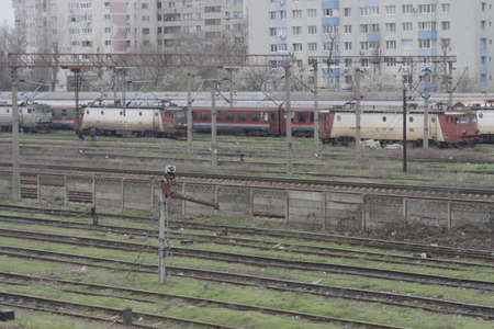Bucharest, Romania, March 13, 2016: Passenger trains are seen the switch yard of Gara de Nord main railway station.のeditorial素材