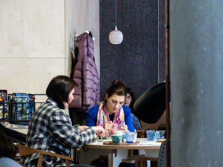 Bucharest, Romania, 21 February 2016: People enjoying lunch in a restaurant in Bucharest.のeditorial素材
