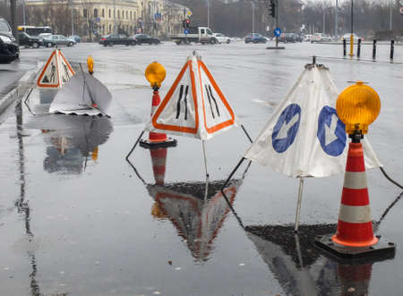 Bucharest, Romania, 27 February 2016: Public works delimited with barriers and signs in Bucharest.のeditorial素材