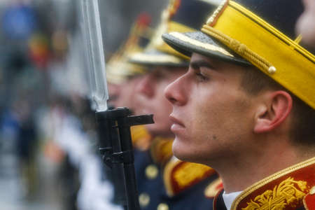 BUCHAREST, ROMANIA - DECEMBER 1, 2010: More than 3,000 soldiers and personnel from security agencies take part in the massive parades on National Day of Romania.のeditorial素材
