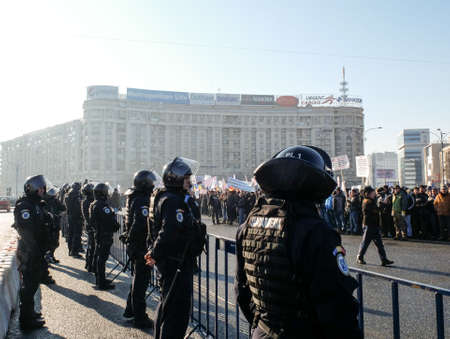 Bucharest, Romania, January 26, 2016: Romanian Gendarmes are participating to a protest in front of the Governmental building, in Bucharest.のeditorial素材