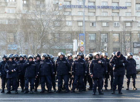 Bucharest, Romania, January 26, 2016: Romanian Gendarmes are participating to a protest in front of the Governmental building, in Bucharest.のeditorial素材