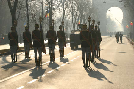 BUCHAREST, ROMANIA - DECEMBER 1, 2011: Military are marching during a military parade in Bucharest. More than 3,000 soldiers and personnel from security agencies take part in the massive parades on National Day of Romania.のeditorial素材