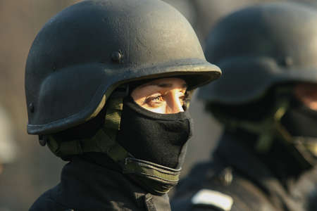 BUCHAREST, ROMANIA - DECEMBER 1, 2011: Military are marching during a military parade in Bucharest. More than 3,000 soldiers and personnel from security agencies take part in the massive parades on National Day of Romania.のeditorial素材