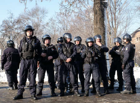 Bucharest, Romania, January 26, 2016: Romanian Gendarmes are participating to a protest in front of the Governmental building, in Bucharest.のeditorial素材