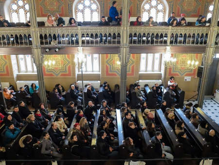 Bucharest, Romania, January 31, 2016: People are participating to a religious service inside the Coral Temple in Bucharest.のeditorial素材