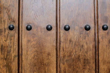 Bucharest, Romania, January 31, 2016: Pattern - Decorative wooden elements with rivets.のeditorial素材