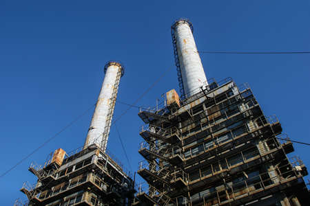 Bucharest, Romania, December 26, 2009: Thermoelectric plant against the blue sky.のeditorial素材