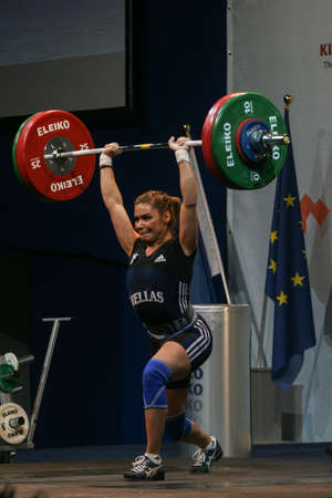 Bucharest, Romania, April 5, 2009: An athlete reacts during European Weightlifting Championship in Bucharest.のeditorial素材