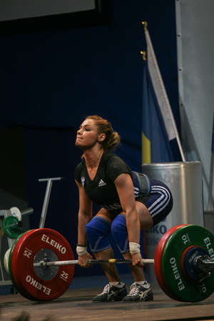 Bucharest, Romania, April 5, 2009: An athlete reacts during European Weightlifting Championship in Bucharest.のeditorial素材
