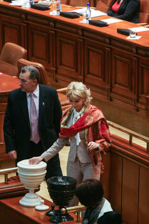Bucharest, Romania, March 4, 2009: Romanian parliamentarians are voting during a parliamentary session inside the Romanian Parliament.のeditorial素材