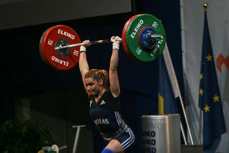 Bucharest, Romania, April 5, 2009: An athlete reacts during European Weightlifting Championship in Bucharest.のeditorial素材
