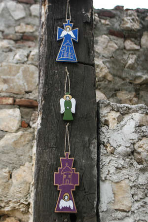 Rasnov, Romania, July 4, 2009: Wooden painted crosses are sold inside Medieval fortress Rasnov, Brasov county, Romania.のeditorial素材