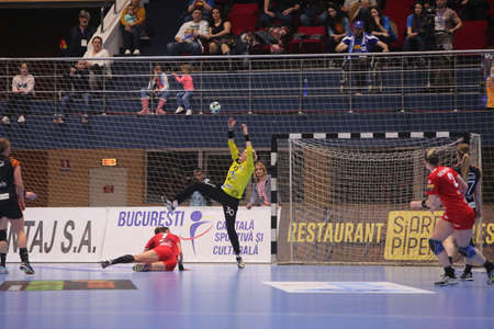 BUCHAREST, ROMANIA - MARCH 03, 2017: WOMEN'S EHF Champions League 2016-17, CSM Bucuresti vs RK Krim Mercator handball game. The goalkeeper from CSM Bucuresti Ungureanu Paula Claudia in action.のeditorial素材