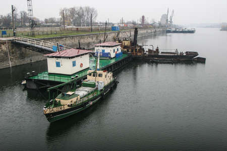 Cetate, Dolj county, Romania, November 15, 2009: Old, rusty steamship anchored in the Cetate harbor,...