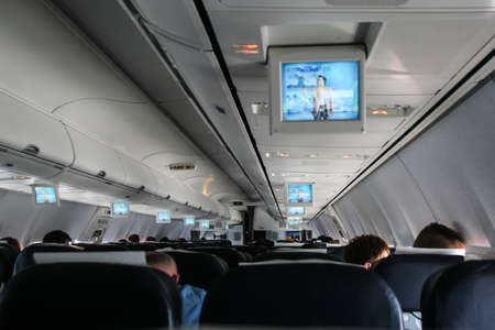 Budapest, Hungary, May 21, 2009: The interior of an airplane with passengers.のeditorial素材