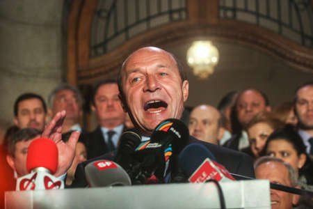 Bucharest, Romania, November 22, 2009: Politician Traian Basescu reacts after the announcement for the results of the presidential elections.のeditorial素材