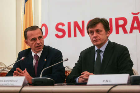 Bucharest, Romania, November 25, 2009: Politicians Mircea Geoana and Crin Antonescu participate in a meeting for signing the cooperation between national liberals and social democrats in Romania, after the presidential elections.のeditorial素材