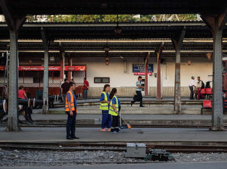 BUCHAREST, ROMANIA, July 15, 2016: Workers are seen in Gara de Nord train station in Bucharest.のeditorial素材