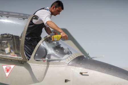 BUZAU, ROMANIA, June 18, 2016: IAR 99 SOIM airplane ground maintenance in the BOBAS air show, on the...