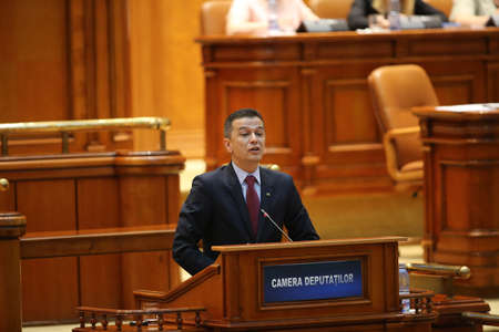 BUCHAREST, ROMANIA - June 21, 2017: Romanian Premier Sorin Grindeanu speaks in front of Parliament during a no-confidence vote submitted by his colleagues from ruling Social Democratic Party (PSD).のeditorial素材