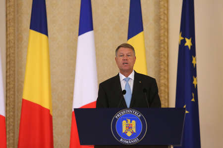 BUCHAREST, ROMANIA - August 24, 2017: Romanian President Klaus Iohannis speaks during the press conference with his French counterpart at Cotroceni Palace. Macron starts in Romania the three-day tour of central and Eastern Europe.のeditorial素材