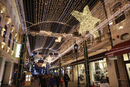 Bucharest, Romania - December 09, 2017: Nightscene in Bucharest center when the Christmas lights and decorations are on.のeditorial素材