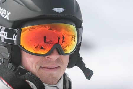 SIBIU, ROMANIA - March 13, 2010: Portrait of a male skier at Balea lake, Fagaras mountains.