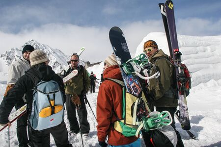 SIBIU, ROMANIA - March 13, 2010: Group of skiers and snowboarders at the Balea lake, Fagaras mountains.のeditorial素材