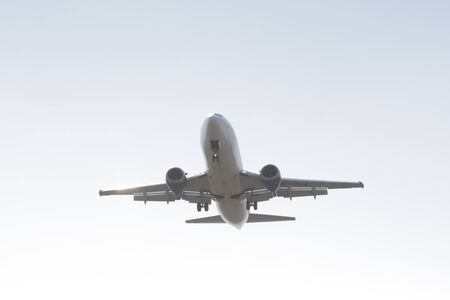 BUCHAREST, ROMANIA - August 15, 2017: Airplane in the cloudy sky.のeditorial素材