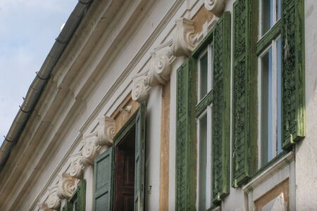 SIBIU, ROMANIA - March 13, 2010: Detail of the windows of the old Brukenthal Avrig Palace in Romania.のeditorial素材