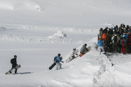SIBIU, ROMANIA - March 13, 2010: Group of snowboarders at the Balea lake, Fagaras mountains.のeditorial素材