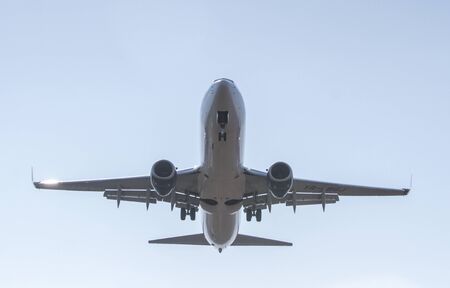 BUCHAREST, ROMANIA - August 15, 2017: Airplane in the cloudy sky.のeditorial素材